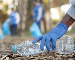 Zubnol Recycling close up hand holding plastic bottle